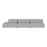 Modern sectional sofa in a soft, light gray fabric with clean lines and minimalistic design. Ideal for any living space.