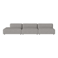 Gray modular sofa with a smooth texture and minimalist design, featuring subtle stitching for added detail.