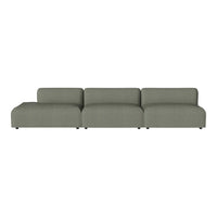 Modern sectional sofa in soft olive green fabric with a textured finish and smooth, clean lines.