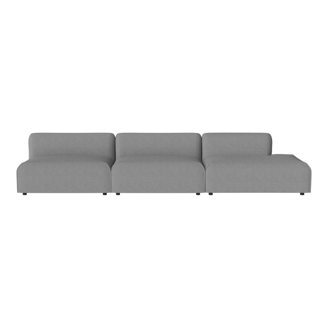 Modern gray sectional sofa with a sleek, minimalist design and soft, smooth fabric texture. Perfect for any living space.