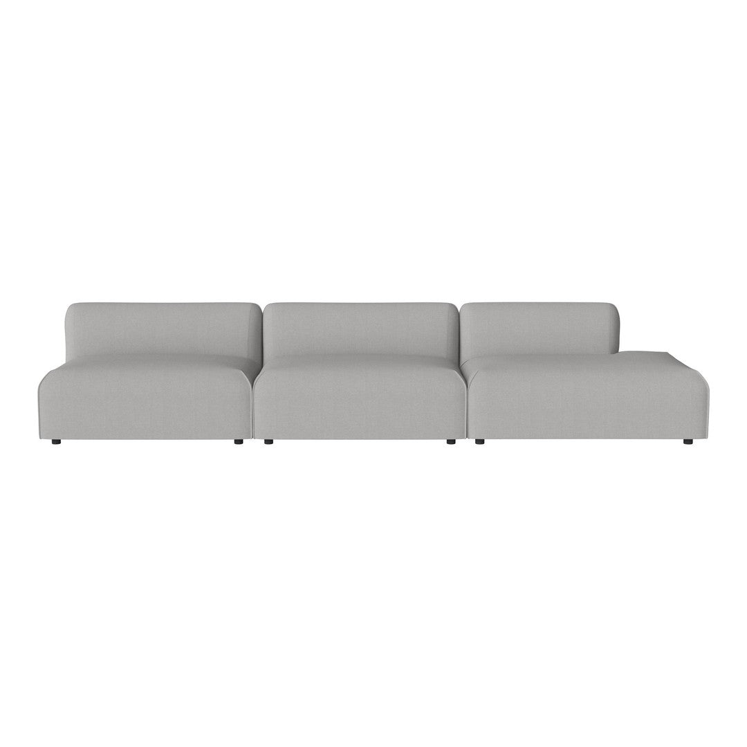 Modern gray sectional sofa with smooth, minimalist design and subtle stitching detail. Ideal for contemporary living spaces.