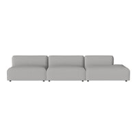 Modern gray sectional sofa with smooth, minimalist design and subtle stitching detail. Ideal for contemporary living spaces.