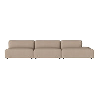Beige sectional sofa with a smooth, minimalist design and subtle, seamless fabric upholstery. Perfect for modern spaces.