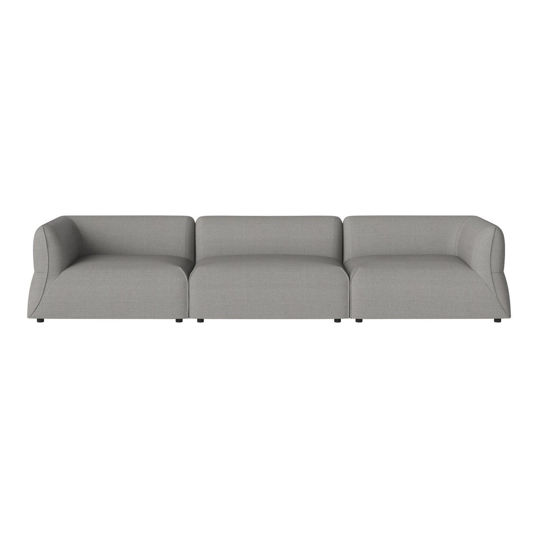 Grey modular sofa with a smooth texture and modern design, featuring clean lines and a minimalist style.