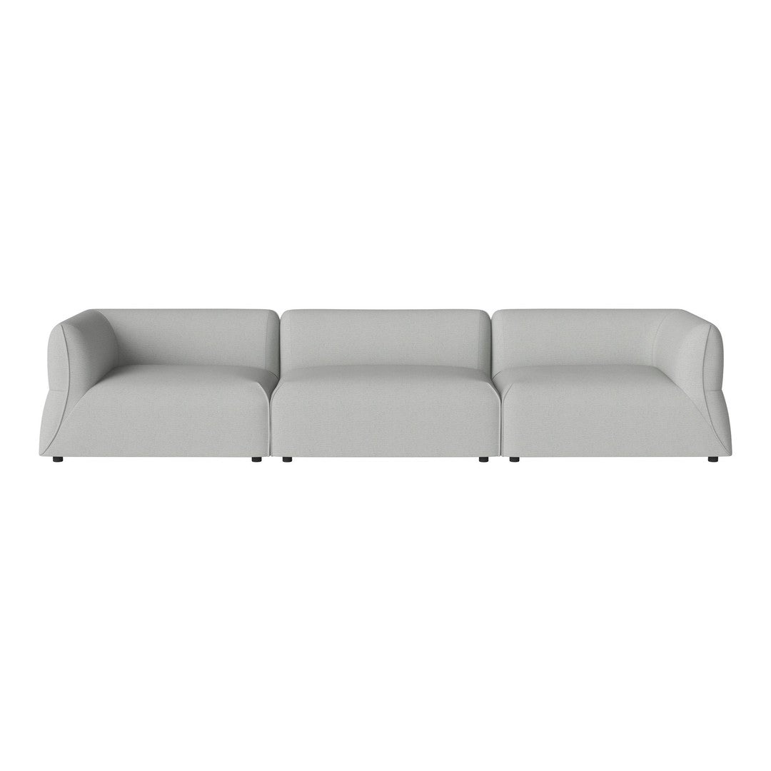 Light grey three-section sofa with smooth, minimalist design and subtle curves. Perfect for modern interiors.
