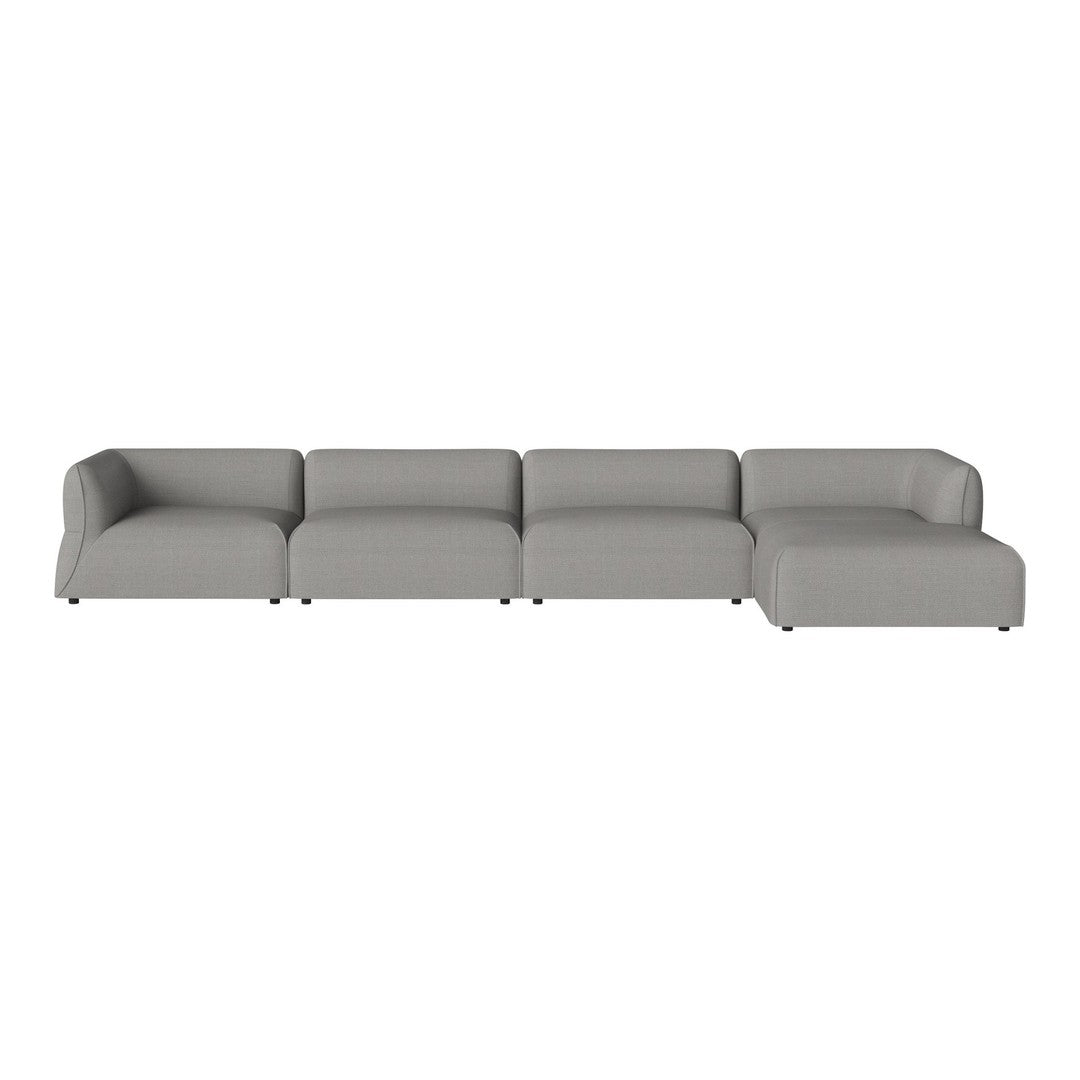 Gray modular sofa with a smooth, modern design and clean lines, ideal for contemporary living spaces.