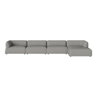 Gray modular sofa with a smooth, modern design and clean lines, ideal for contemporary living spaces.