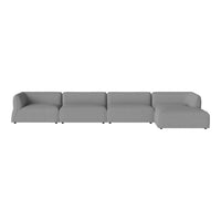 Gray sectional sofa with a modern design and plush fabric upholstery, featuring clean lines and no visible patterns.