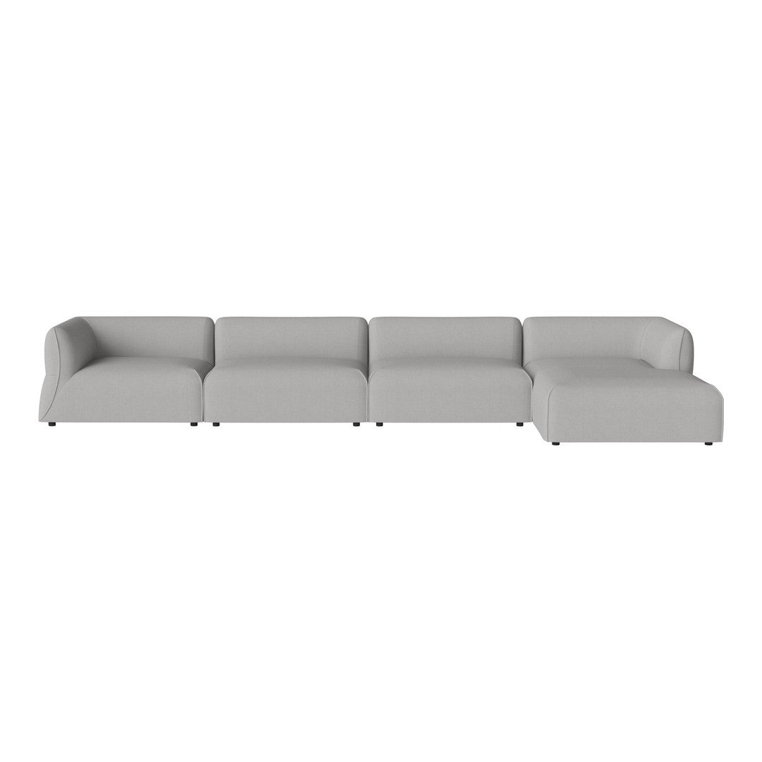 Gray modular sectional sofa with a smooth, minimalist design and no visible patterns. Perfect for modern living spaces.