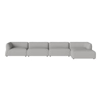 Gray modular sectional sofa with a smooth, minimalist design and no visible patterns. Perfect for modern living spaces.