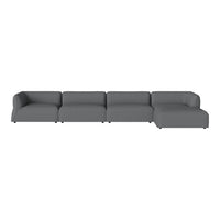Gray sectional sofa with a sleek, modern design and clean lines, perfect for contemporary living spaces.