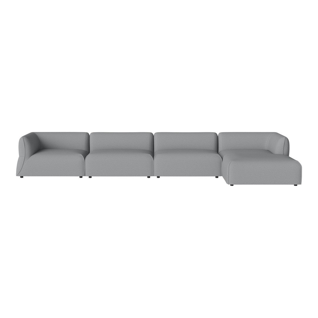 Modern gray sectional sofa with a sleek, minimalistic design and smooth fabric upholstery. Perfect for contemporary spaces.