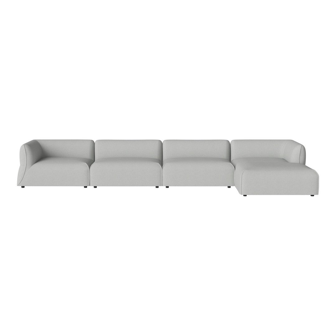 Modern gray sectional sofa with clean lines, offering a sleek and minimalist design for contemporary spaces.