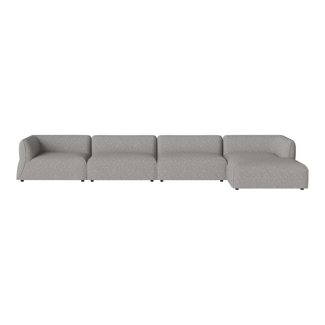Gray sectional sofa with a minimalist design and smooth fabric texture. Perfect for modern living spaces.