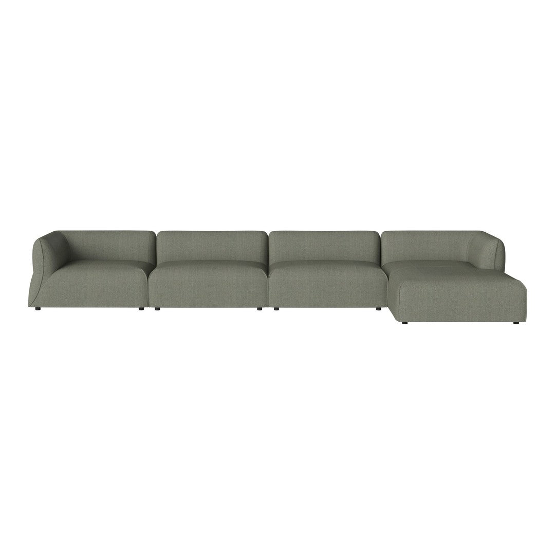 Sleek sectional sofa in muted olive green fabric with a minimalist design and smooth, modern lines.