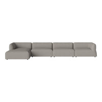 Modern gray sectional sofa with a smooth, minimalist design and subtle curves. Perfect for contemporary living spaces.