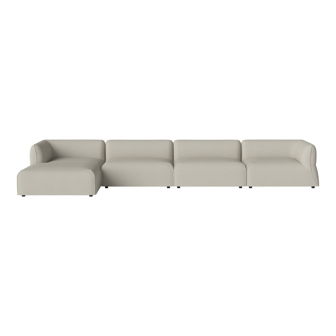 Light beige modular sofa with smooth, contemporary lines and subtle, modern design. Perfect for any living space.