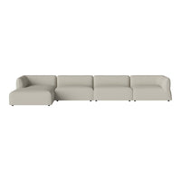 Light beige modular sofa with smooth, contemporary lines and subtle, modern design. Perfect for any living space.
