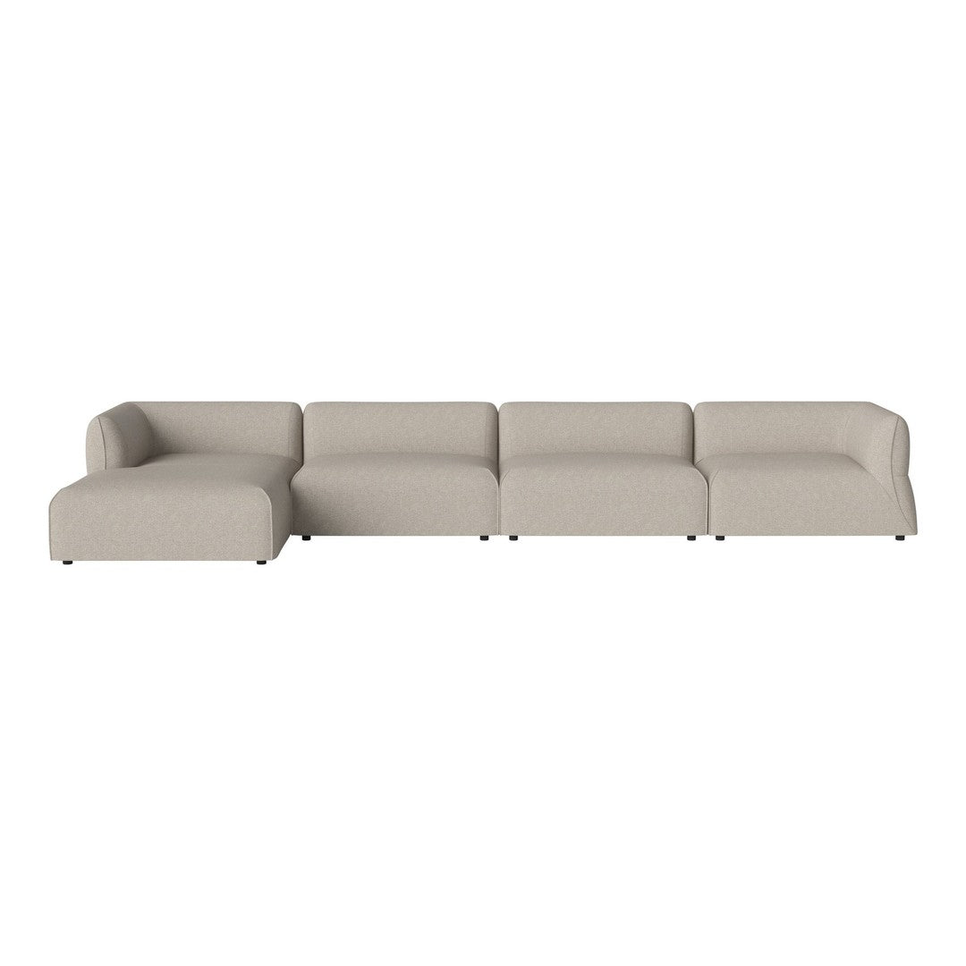 Light beige sectional sofa with smooth, minimalist design and no patterns, ideal for modern living spaces.