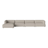Light beige sectional sofa with smooth, minimalist design and no patterns, ideal for modern living spaces.