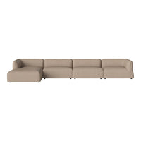 Beige sectional sofa with smooth, modern upholstery, featuring clean lines and a minimalist design. Perfect for any decor.