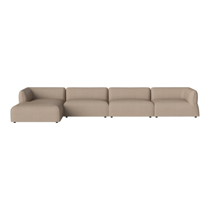 Beige sectional sofa with smooth, modern upholstery, featuring clean lines and a minimalist design. Perfect for any decor.