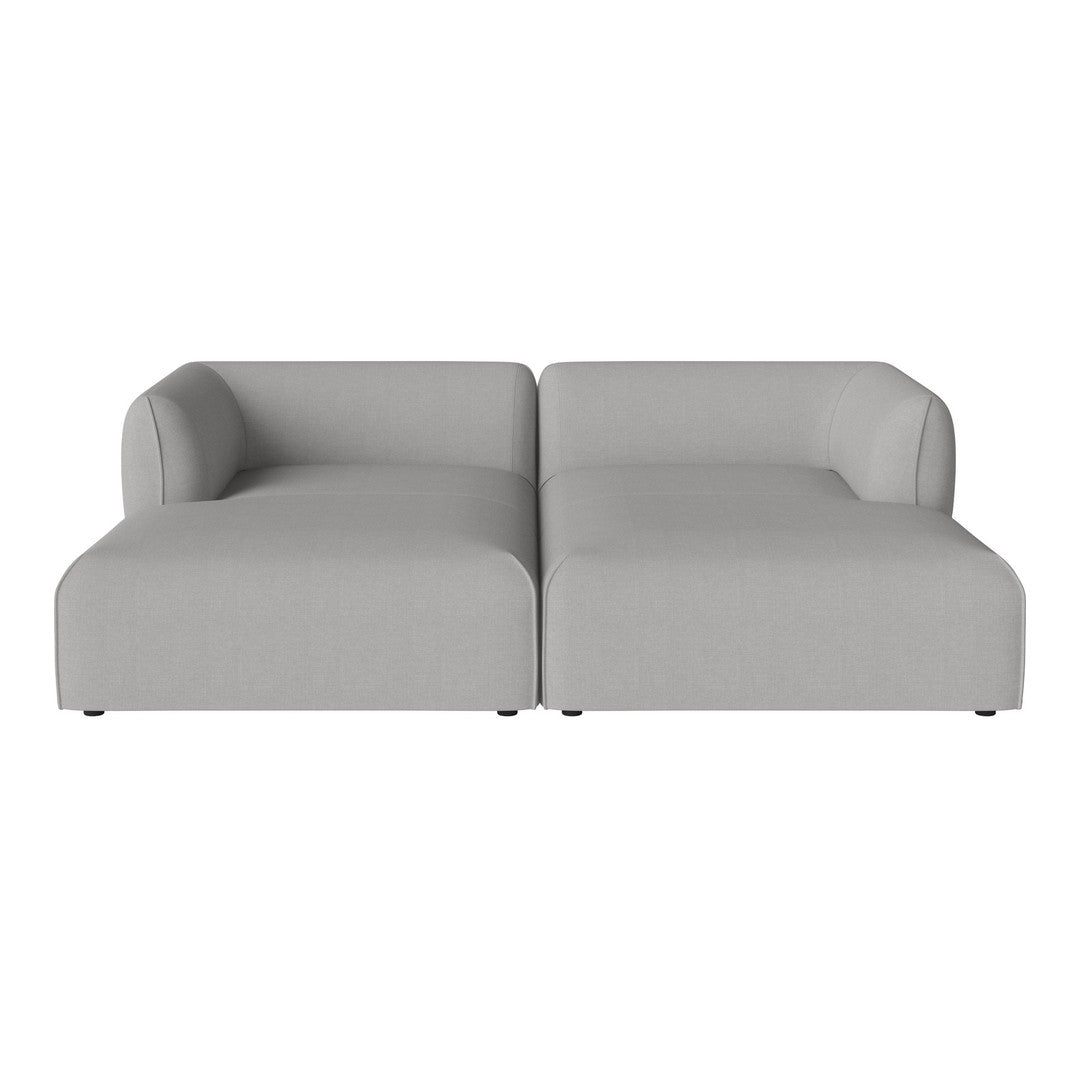 Contemporary light gray sofa with a minimalist design and smooth fabric texture. Ideal for modern living spaces.