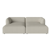 Light beige, modern sofa with sleek lines and minimalistic design, perfect for contemporary living spaces.