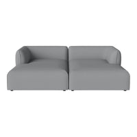 Gray modular sofa with smooth, minimalist design and no patterns for a contemporary look. Ideal for modern spaces.