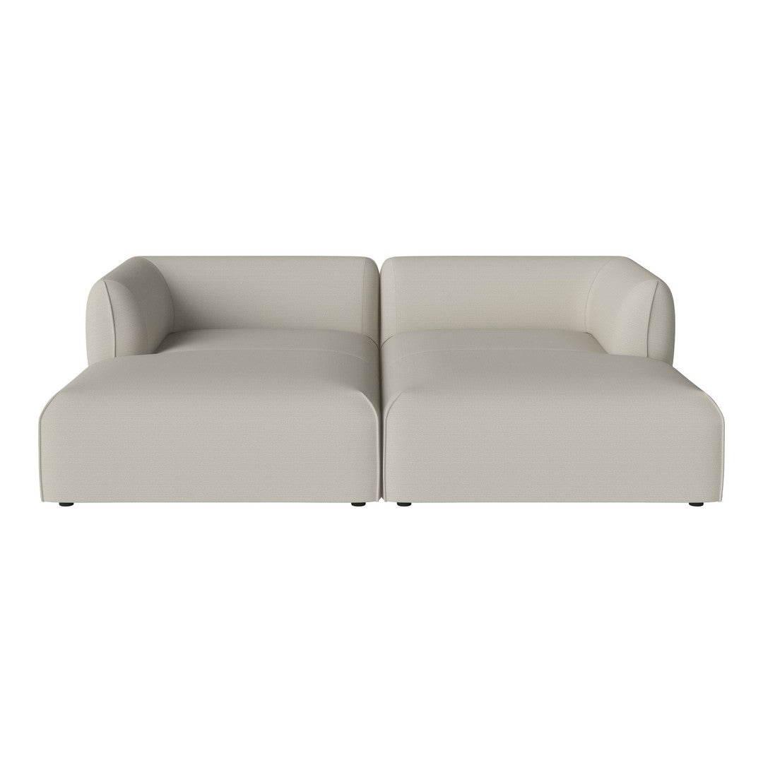 Sleek beige sofa with smooth, minimalist design and no visible patterns. Perfect for modern living spaces.