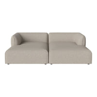 Beige two-piece sofa with smooth fabric and minimalist design, featuring soft edges and no visible patterns.