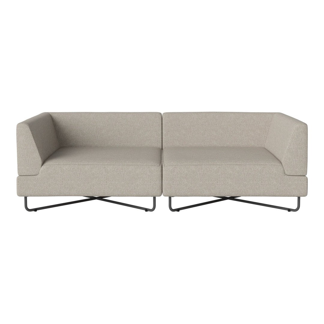 Beige modular sofa with a textured fabric and minimalist design, featuring sleek black metal legs.