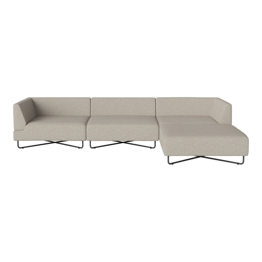 Light beige sectional sofa with a minimalist design and subtle texture, featuring sleek black metal legs.