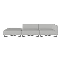Modern gray sectional sofa with sleek lines and minimalist design, featuring a smooth, solid fabric upholstery.