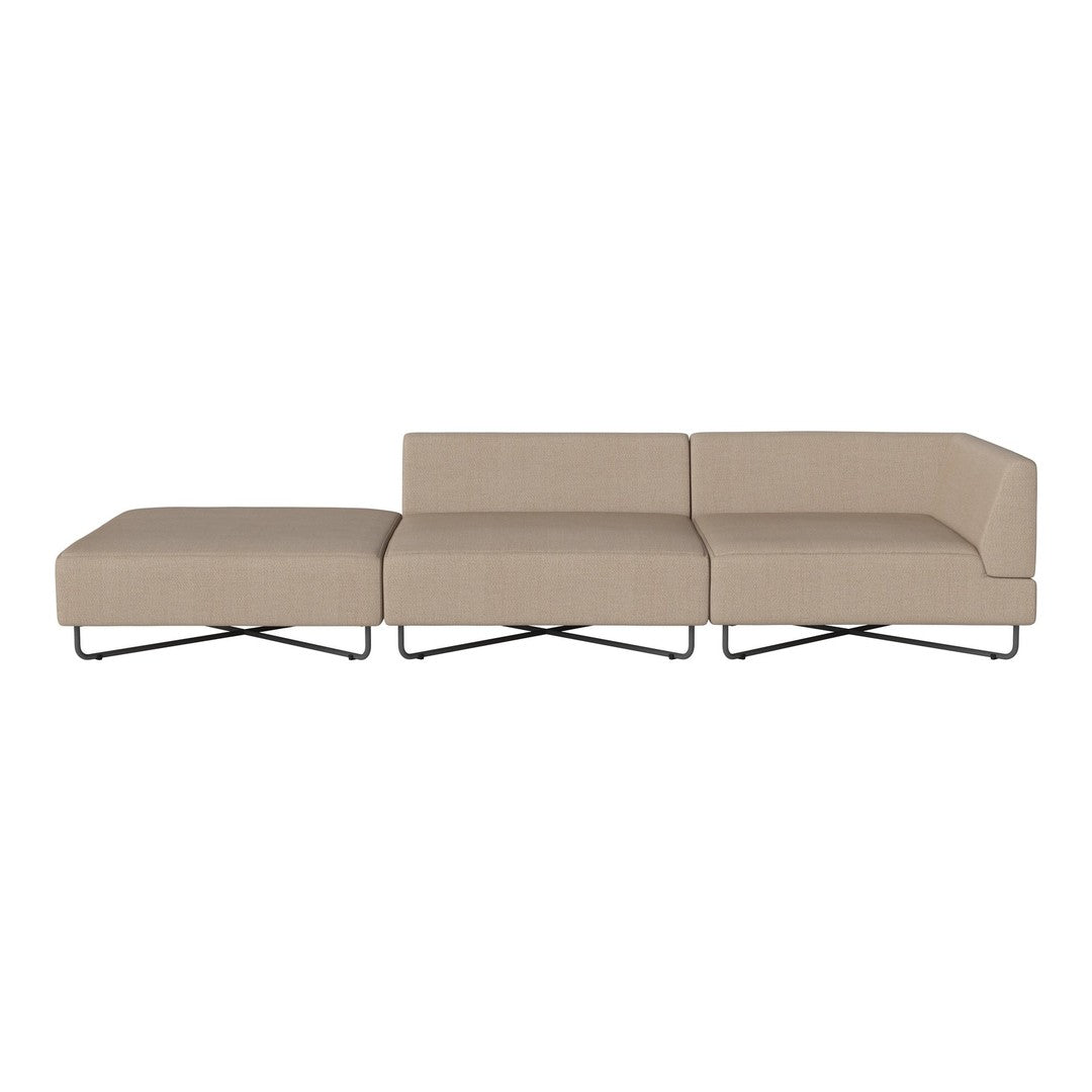 Beige sectional sofa with a minimalist design and smooth fabric texture, featuring clean lines and a modern chrome base.