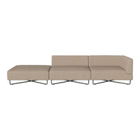 Beige sectional sofa with a minimalist design and smooth fabric texture, featuring clean lines and a modern chrome base.
