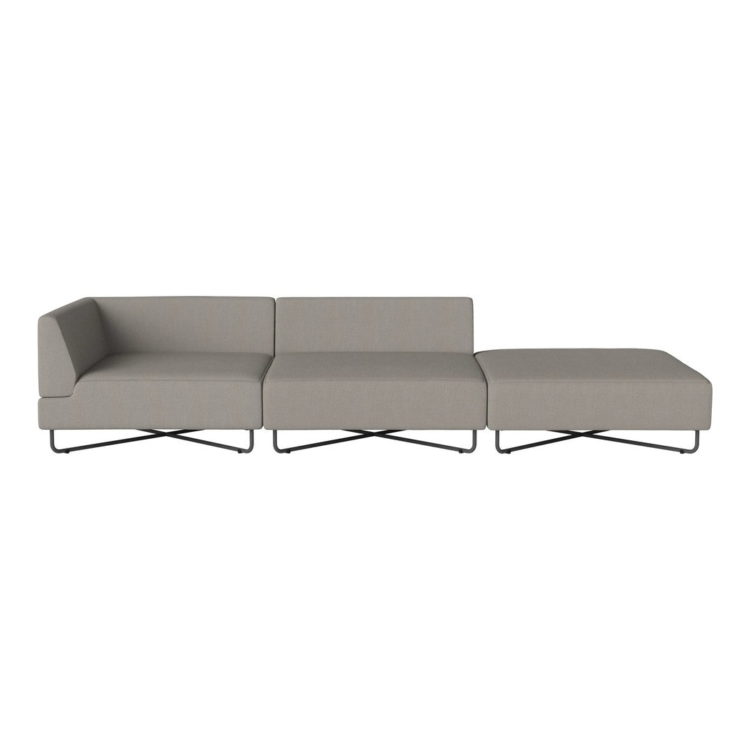 Modern gray sectional sofa with a sleek design and minimalist pattern. Features a smooth fabric texture and metal legs.