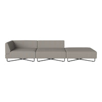 Modern gray sectional sofa with a sleek design and minimalist pattern. Features a smooth fabric texture and metal legs.