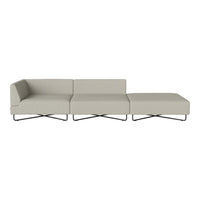 Light gray modular sofa with smooth fabric and sleek metal legs, featuring a contemporary design. Perfect for modern decor.