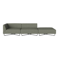 Modern sectional sofa in muted olive green fabric with sleek metal base, showcasing minimalist design and clean lines.