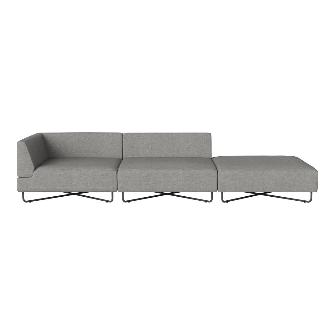 Modern gray sectional sofa with sleek lines and minimalist design, featuring a smooth fabric texture and metallic legs.