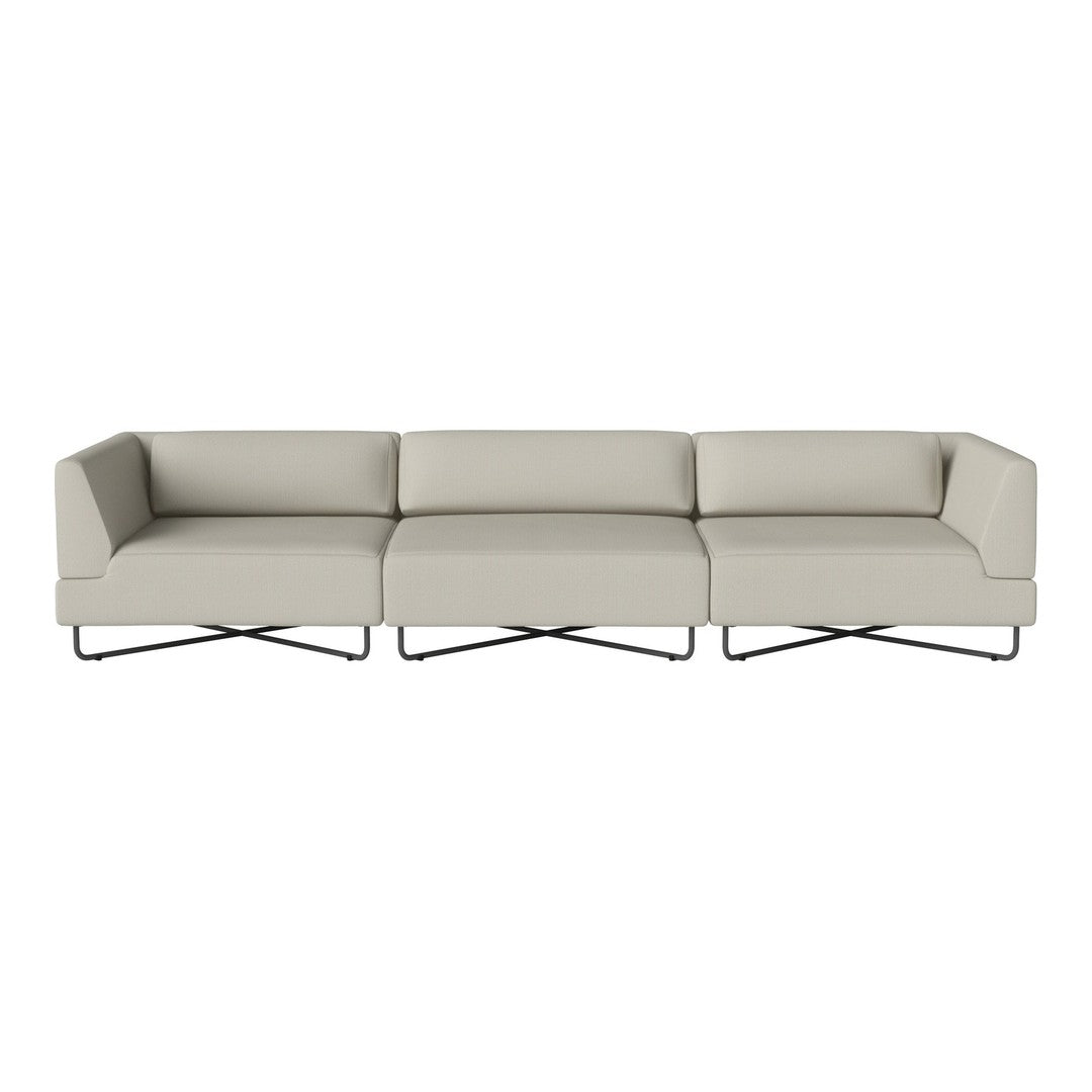 Light gray three-seater sofa with sleek lines and minimalist design, complemented by modern metal legs.