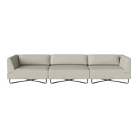 Light gray three-seater sofa with sleek lines and minimalist design, complemented by modern metal legs.