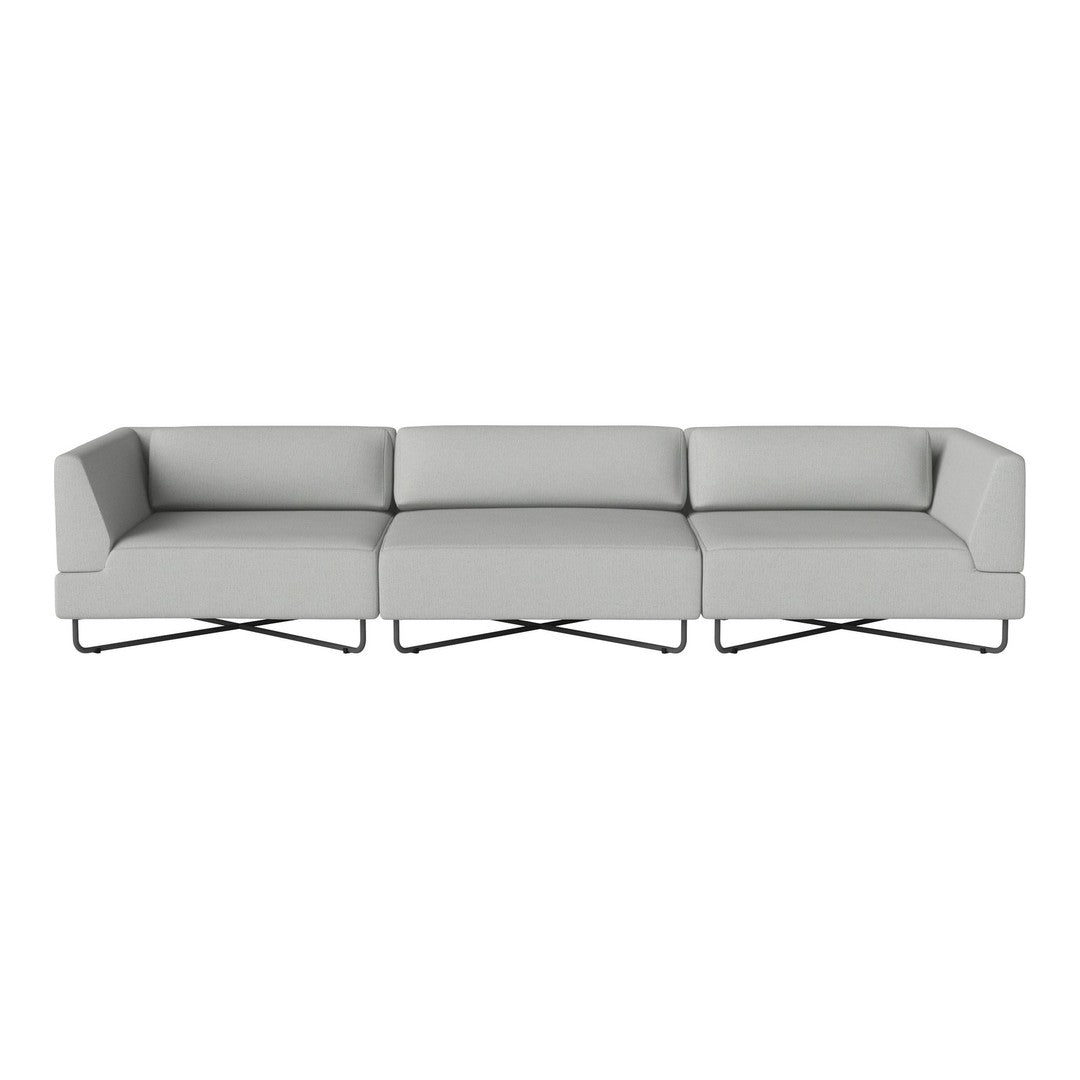 Elegant gray sofa with minimalist design and sleek metal legs, featuring a smooth, solid color upholstery.