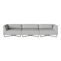 Elegant gray sofa with minimalist design and sleek metal legs, featuring a smooth, solid color upholstery.