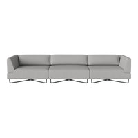 Gray sectional sofa with clean lines and modern design, featuring a minimalist style and bold geometric pattern.