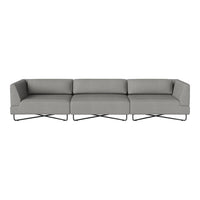 Gray sectional sofa with clean lines and modern design, featuring a neutral color palette and minimalistic detailing.