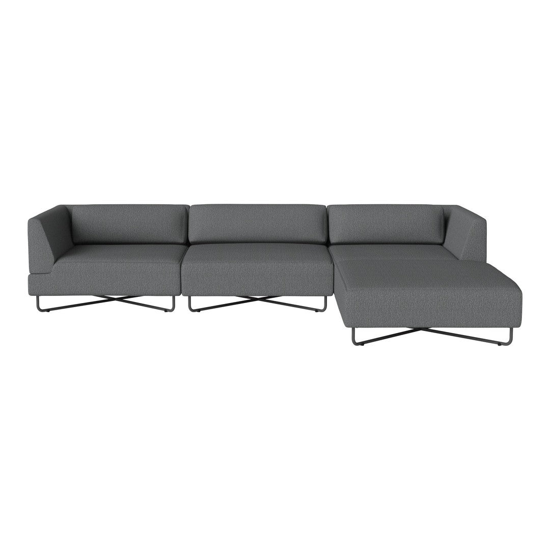Modern gray sectional sofa with sleek lines and a minimalist design, featuring a solid color and smooth texture.