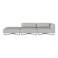 Contemporary gray sectional sofa with clean lines and a minimalist design, featuring a sleek metal base.