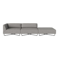 Gray modular sofa with a sleek design and subtle texture, featuring a minimalist style and metal accents.